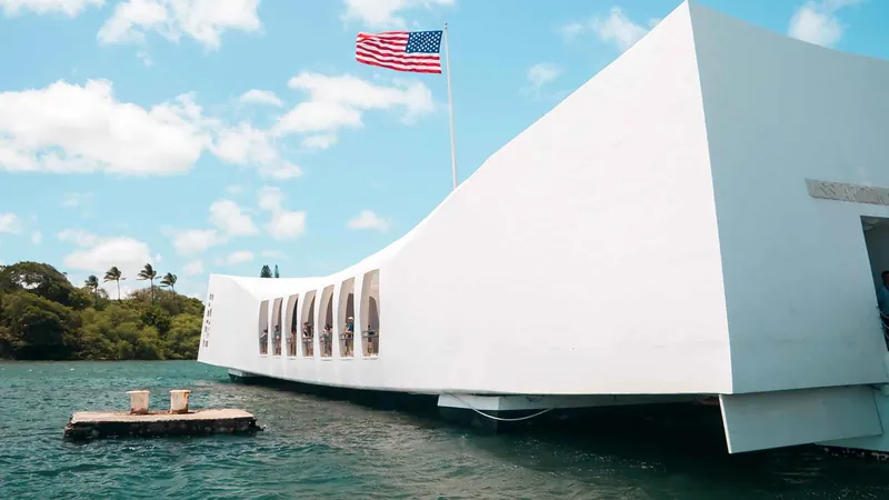 Pearl Harbor tour visitors at the USS Arizona Memorial in Honolulu, illustrative scene of the memorial