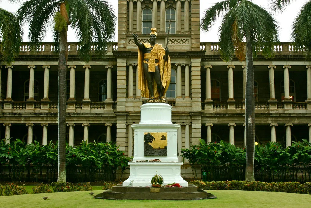 King Kamehameha statue passed on a Pearl Harbor tour from Honolulu