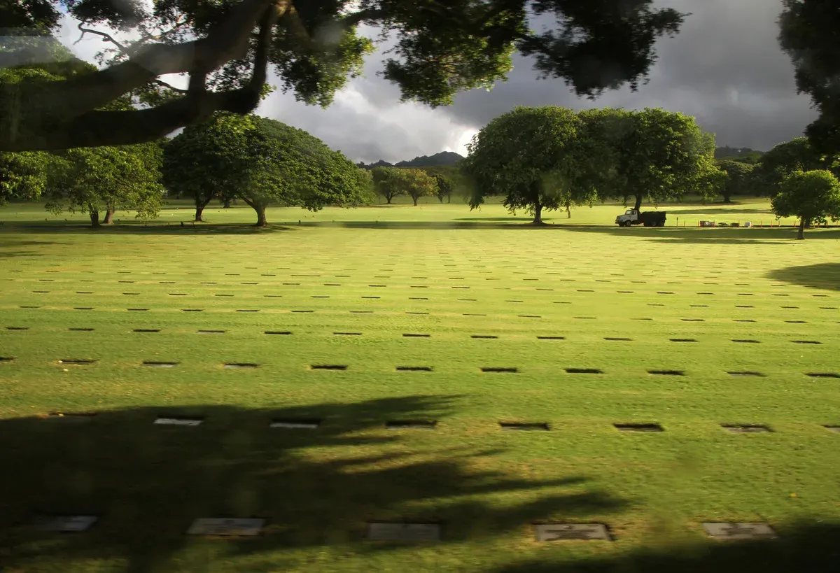 Grave lawns at Punchbowl cemetery, a stop on Pearl Harbor tours from Honolulu